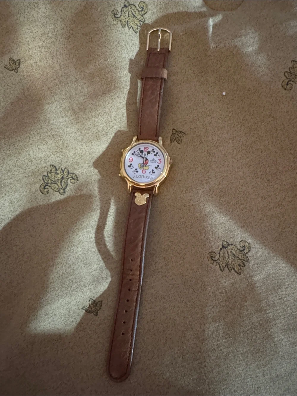 Needs batteries: Disney Lorus Gold-Tone Mickey Mouse Watch with Brown Strap